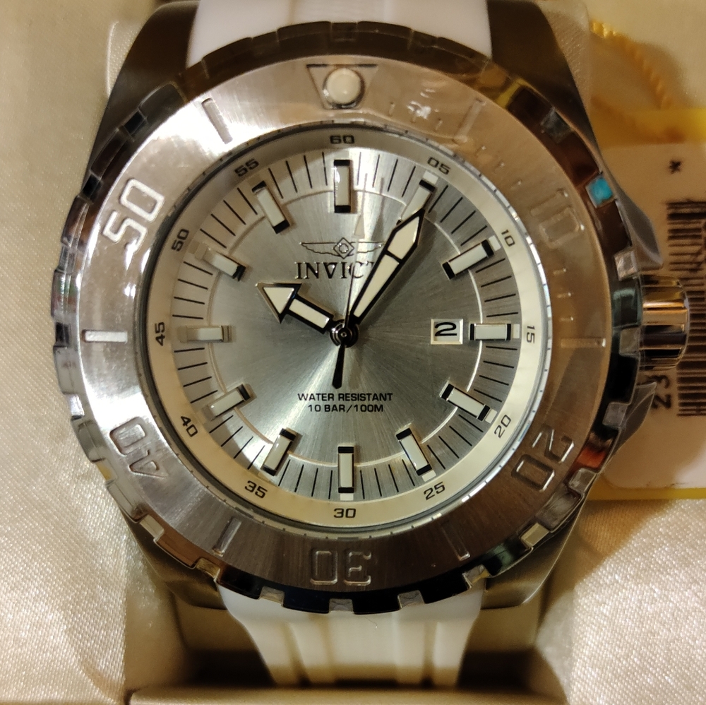 Invicta 52mm Pro Diver Silver Dial With A White Strap.